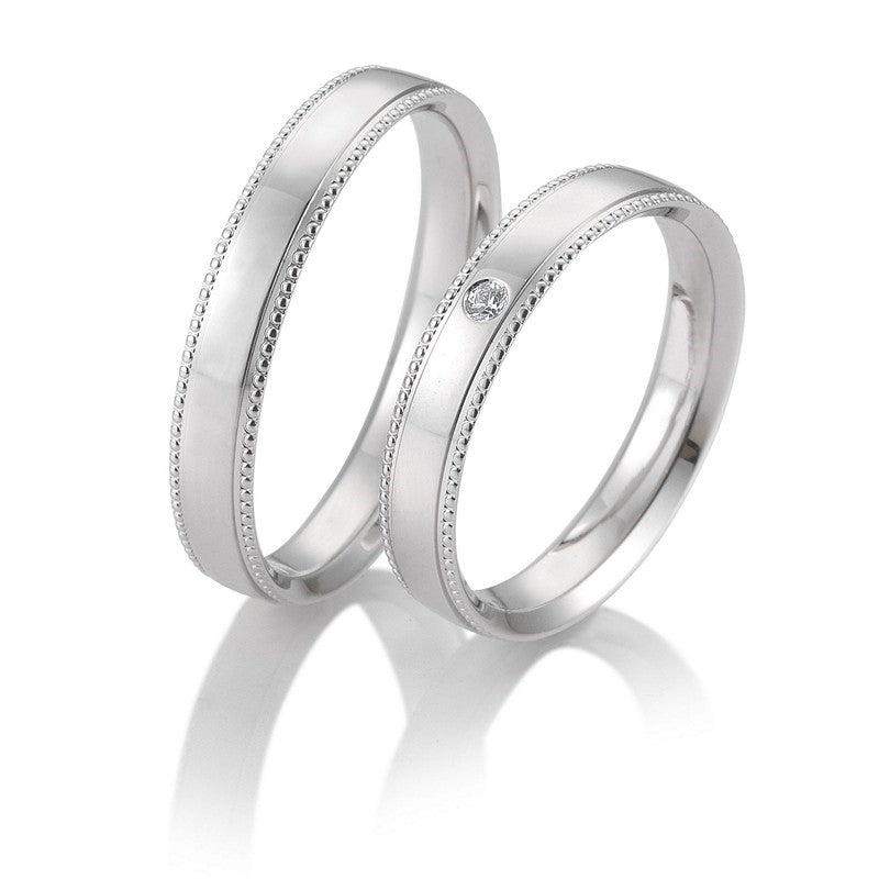 Eksklusive Breuning vielsesringe i 9 eller 14 karat hvidguld med 0,025 ct diamanter